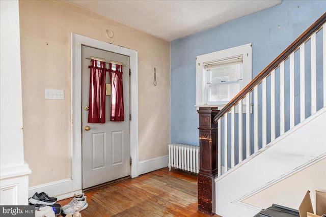 21 W Pall Mall St, Winchester, VA 22601 - foyer entrance with radiator, wood finished floors, stairway, and baseboards