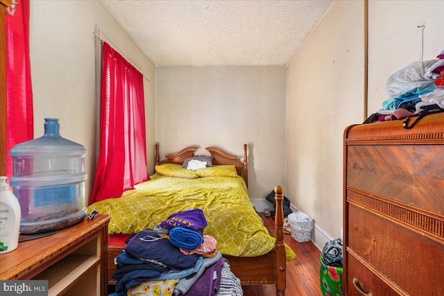 21 W Pall Mall St, Winchester, VA 22601 - bedroom featuring a textured ceiling and hardwood / wood-style floors