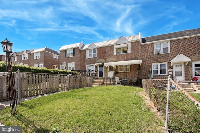 view of front of home featuring a residential view and brick siding