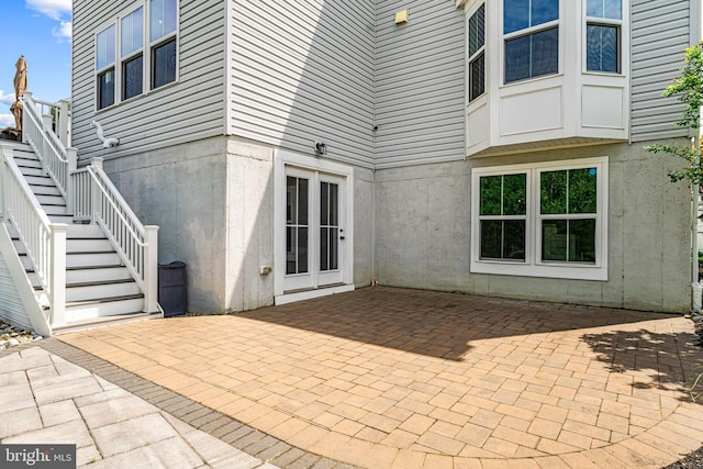view of patio with stairway