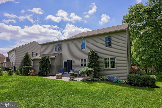 2969 Hearthside Ln, Lancaster, PA 17601 - back of house with a patio and a lawn