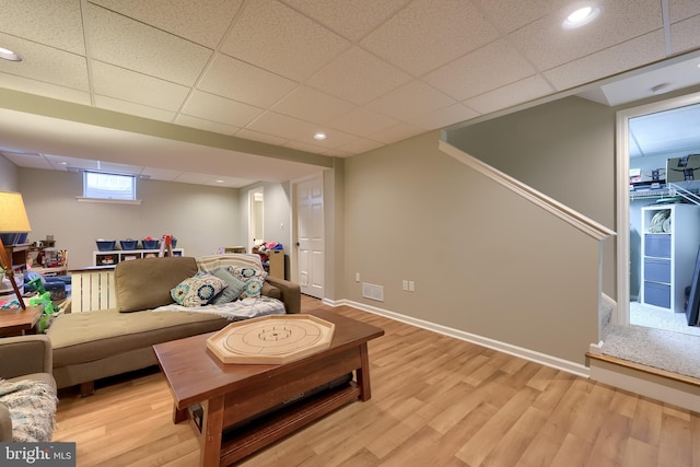 2969 Hearthside Ln, Lancaster, PA 17601 - living area with light wood finished floors, a drop ceiling, baseboards, recessed lighting, and stairway
