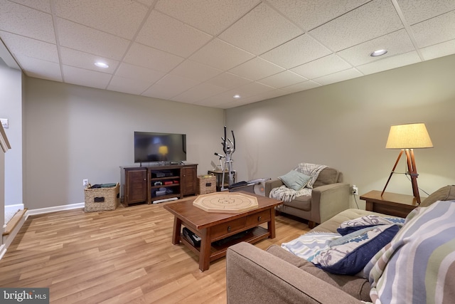 2969 Hearthside Ln, Lancaster, PA 17601 - living area with light wood-style flooring, a paneled ceiling, recessed lighting, and baseboards