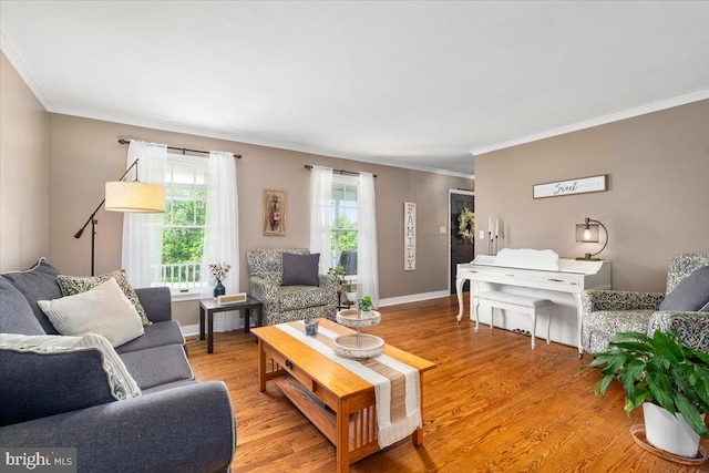 7501 Mason Ct, Middletown, MD 21769 - living area featuring ornamental molding, wood finished floors, and baseboards