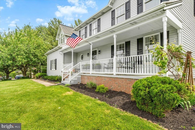 7501 Mason Ct, Middletown, MD 21769 - view of front of house with a porch and a front yard