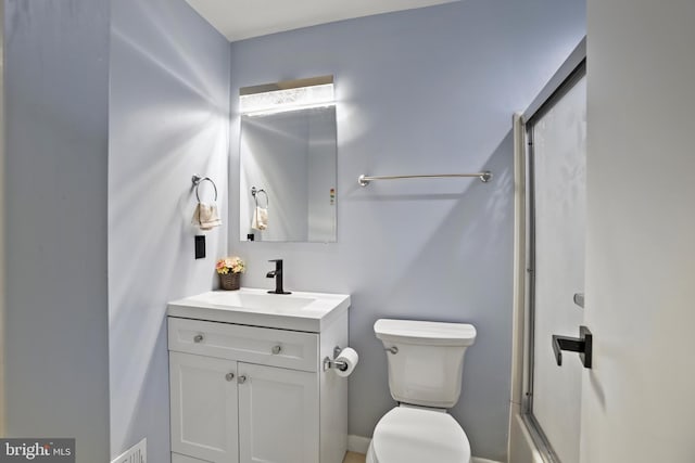 1218 Summerfield Dr, Herndon, VA 20170 - bathroom with a shower with shower door, toilet, and vanity