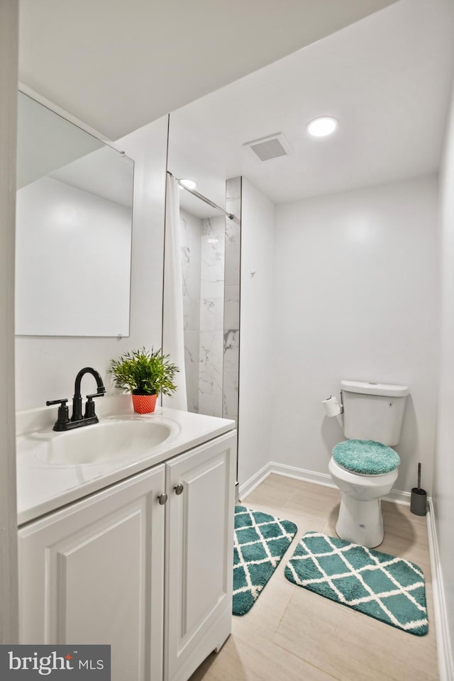1218 Summerfield Dr, Herndon, VA 20170 - full bathroom with toilet, vanity, baseboards, a shower, and recessed lighting