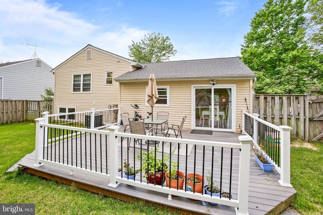 1218 Summerfield Dr, Herndon, VA 20170 - back of property with outdoor dining space, a deck, and roof with shingles