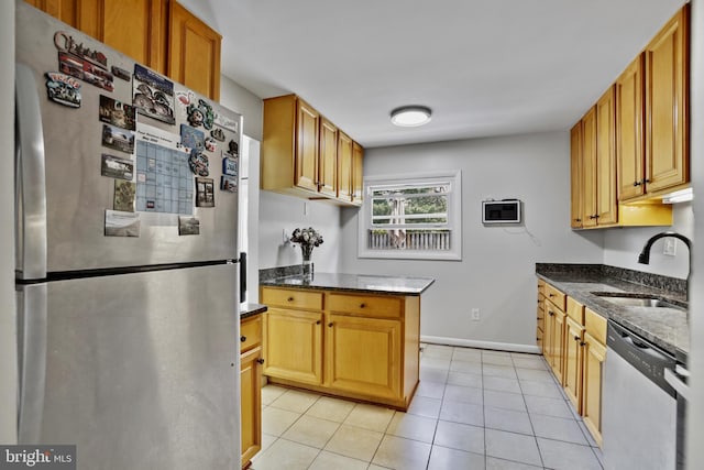 1218 Summerfield Dr, Herndon, VA 20170 - kitchen with appliances with stainless steel finishes, a sink, dark stone countertops, light tile patterned floors, and baseboards