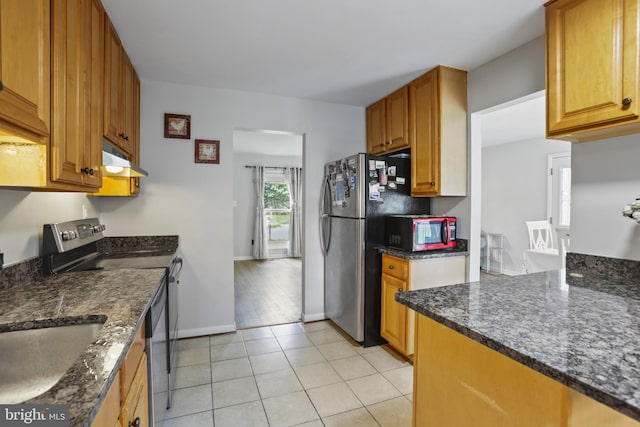 1218 Summerfield Dr, Herndon, VA 20170 - kitchen with appliances with stainless steel finishes, under cabinet range hood, baseboards, light tile patterned floors, and a sink