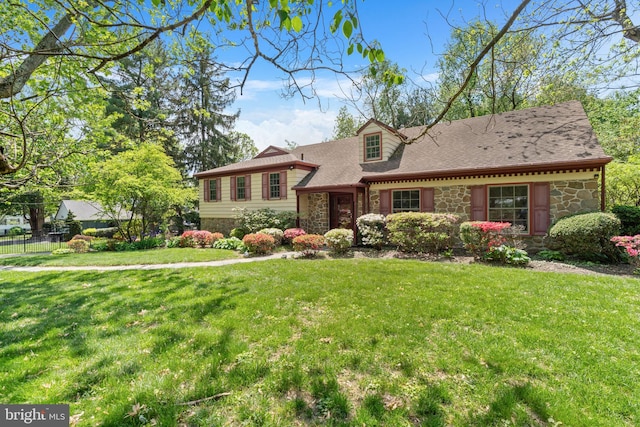 split level home with stone siding