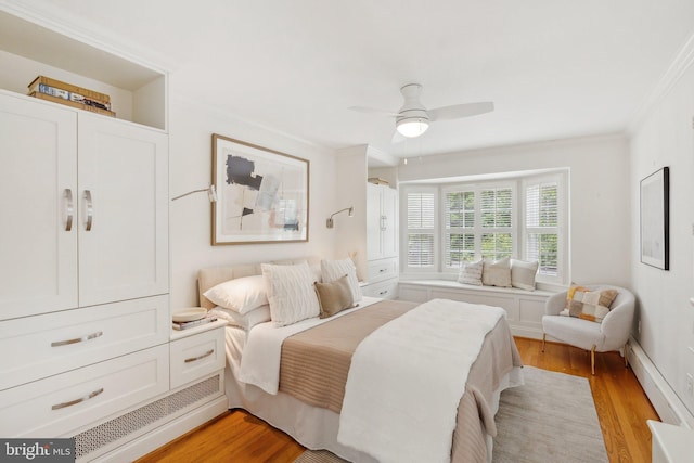3309 Q St NW, Washington, DC 20007 - bedroom with ornamental molding, light wood-style flooring, and a ceiling fan