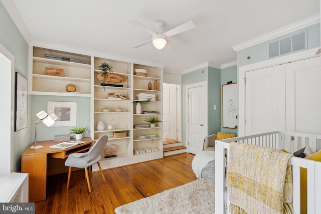 3309 Q St NW, Washington, DC 20007 - home office with crown molding, a ceiling fan, and hardwood / wood-style floors