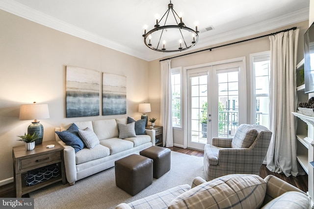 23 Arch Pl Unit 475, Gaithersburg, MD 20878 - living area featuring a chandelier, ornamental molding, french doors, wood finished floors, and baseboards