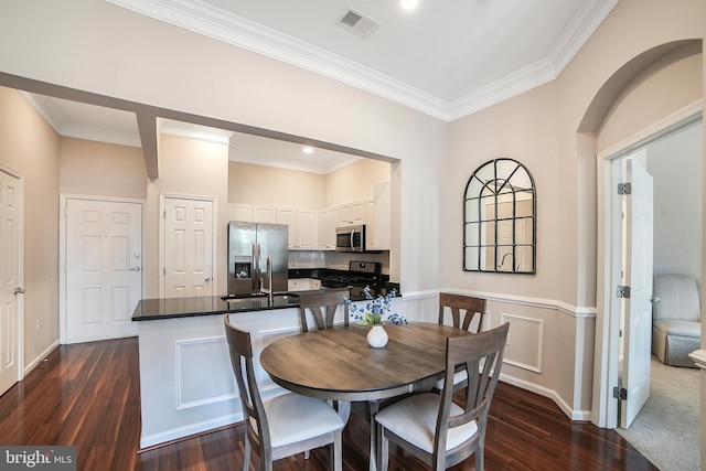 23 Arch Pl Unit 475, Gaithersburg, MD 20878 - dining space with dark wood-type flooring, ornamental molding, and baseboards
