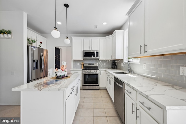 4 Elma Ave, Burlington, NJ 08016 - kitchen featuring appliances with stainless steel finishes, a sink, tasteful backsplash, light tile patterned floors, and recessed lighting