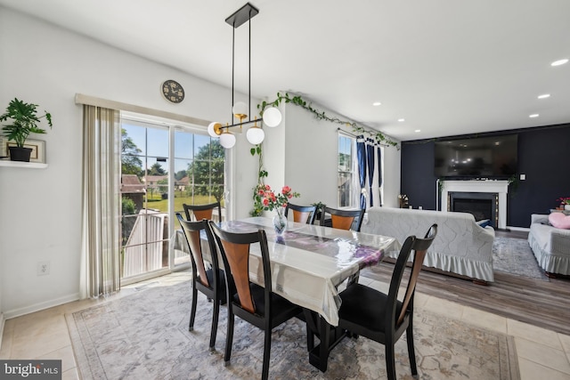 4 Elma Ave, Burlington, NJ 08016 - dining room featuring tile patterned floors, a glass covered fireplace, recessed lighting, and baseboards