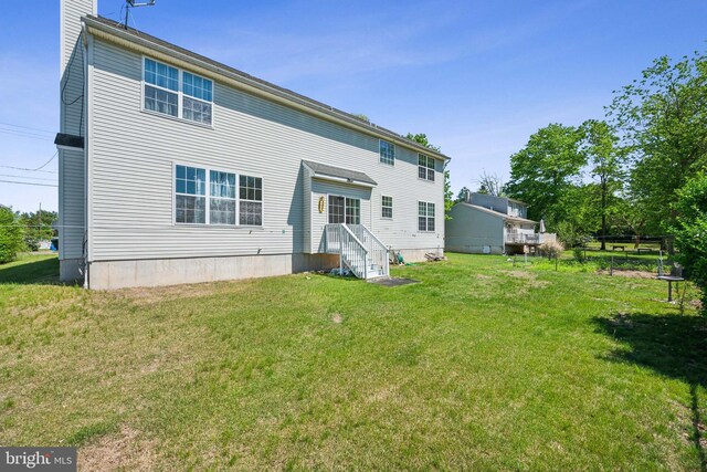4 Elma Ave, Burlington, NJ 08016 - rear view of property with a yard and a chimney