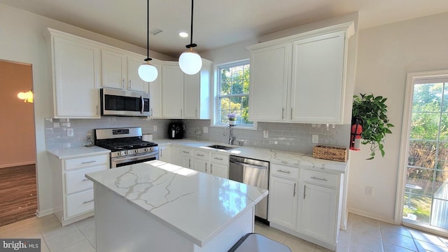 4 Elma Ave, Burlington, NJ 08016 - kitchen with stainless steel appliances, a sink, healthy amount of natural light, a center island, and recessed lighting