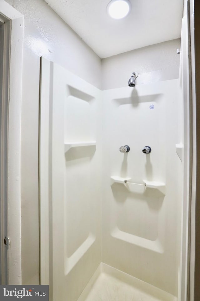 full bath featuring a shower