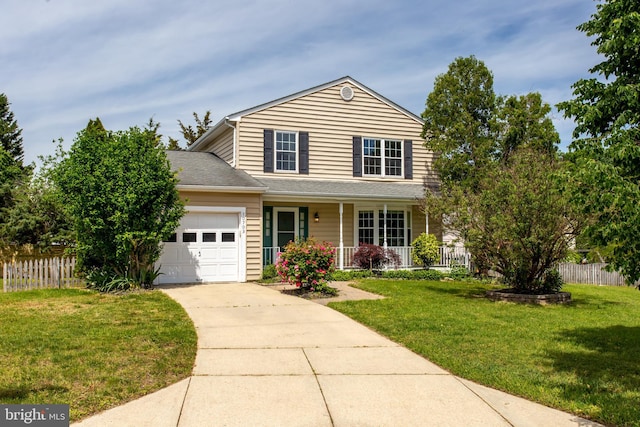 10703 Moray Ct, Cheltenham, MD 20623 - traditional-style home with covered porch, concrete driveway, and a garage