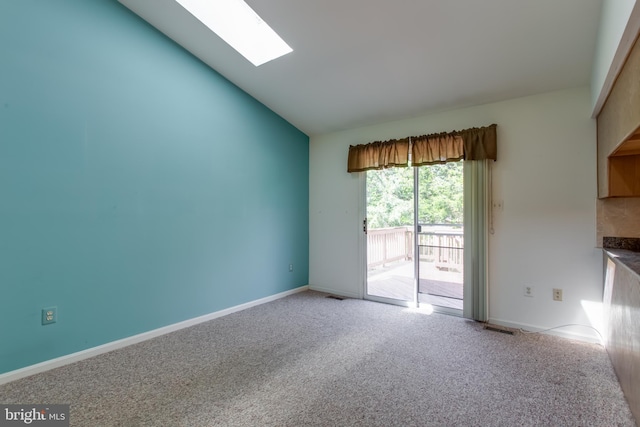 10703 Moray Ct, Cheltenham, MD 20623 - carpeted spare room with a skylight, lofted ceiling, and baseboards