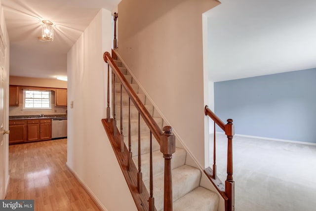 10703 Moray Ct, Cheltenham, MD 20623 - stairs with wood finished floors and baseboards