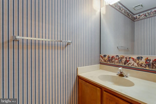 10703 Moray Ct, Cheltenham, MD 20623 - bathroom featuring wallpapered walls and vanity