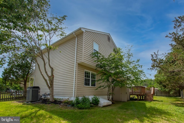 10703 Moray Ct, Cheltenham, MD 20623 - back of house featuring central AC unit and a wooden deck