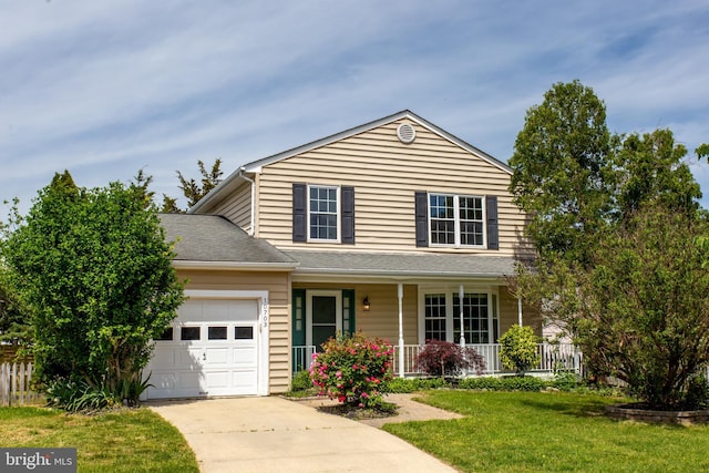 10703 Moray Ct, Cheltenham, MD 20623 - traditional-style home featuring a porch, an attached garage, a front yard, and driveway