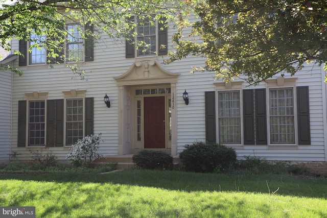 colonial house with a front lawn