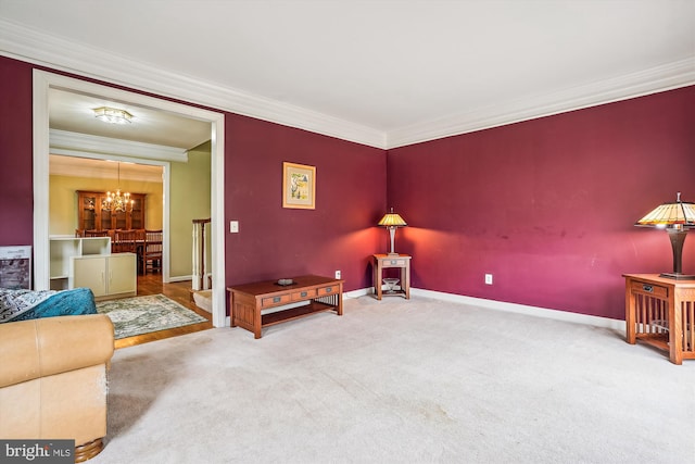 12630 Garry Glen Dr, Bristow, VA 20136 - sitting room with a chandelier, crown molding, baseboards, and carpet
