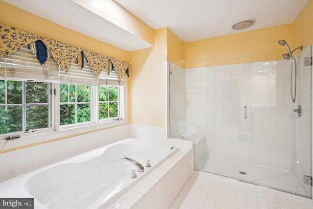 12630 Garry Glen Dr, Bristow, VA 20136 - full bathroom featuring a stall shower, a bath, and tile patterned flooring