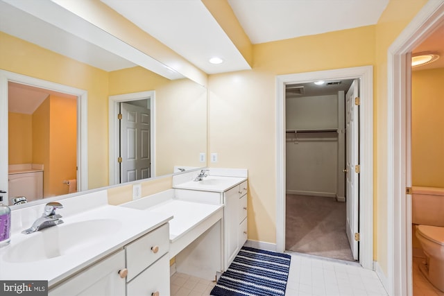 12630 Garry Glen Dr, Bristow, VA 20136 - full bath with toilet, tile patterned floors, vanity, baseboards, and recessed lighting