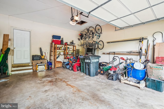 12630 Garry Glen Dr, Bristow, VA 20136 - garage featuring a garage door opener