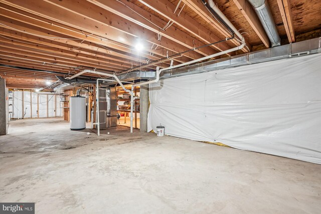 12630 Garry Glen Dr, Bristow, VA 20136 - unfinished below grade area featuring water heater