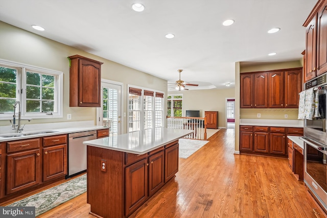 12630 Garry Glen Dr, Bristow, VA 20136 - kitchen with a sink, appliances with stainless steel finishes, light countertops, and recessed lighting