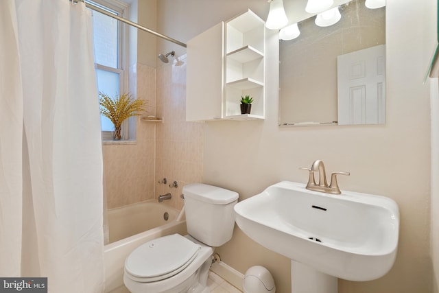520 E Street Ne 105, Washington, DC 20002 - full bathroom with toilet, baseboards, shower / bath combo with shower curtain, and a sink