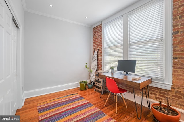 520 E Street Ne 105, Washington, DC 20002 - office with baseboards, a healthy amount of sunlight, brick wall, and wood finished floors