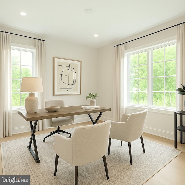 office featuring baseboards, recessed lighting, and wood finished floors