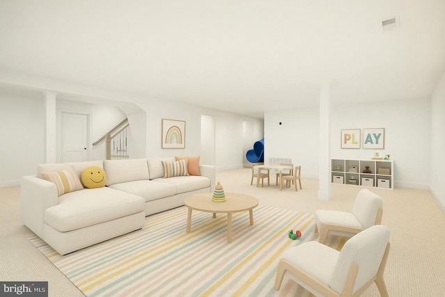 living room featuring carpet and baseboards