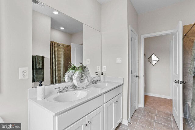LOT484 Mountain Laurel Blvd Ashton, Unit Ashton, Ranson, WV 25438 - bathroom with a sink, tile patterned flooring, tiled shower, and visible vents