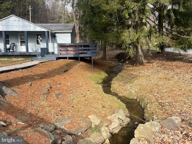 view of yard with a porch