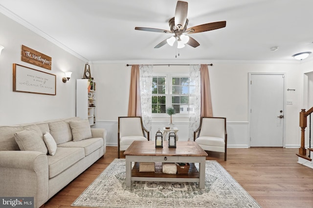 443 Deerwood Dr, Fredericksburg, VA 22401 - living area with ceiling fan, crown molding, wood finished floors, stairway, and baseboards