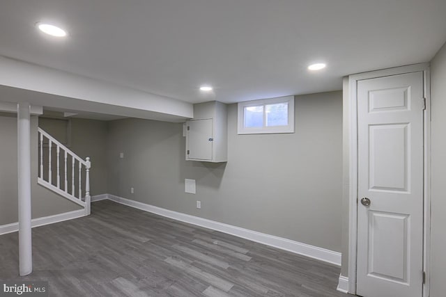 7004 Alden Rd, Pikesville, MD 21208 - below grade area with dark wood-style floors, baseboards, recessed lighting, and stairway