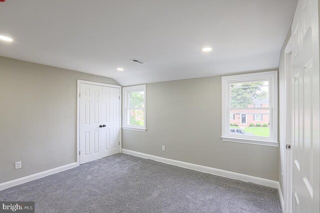 7004 Alden Rd, Pikesville, MD 21208 - unfurnished bedroom with carpet, vaulted ceiling, recessed lighting, baseboards, and a closet
