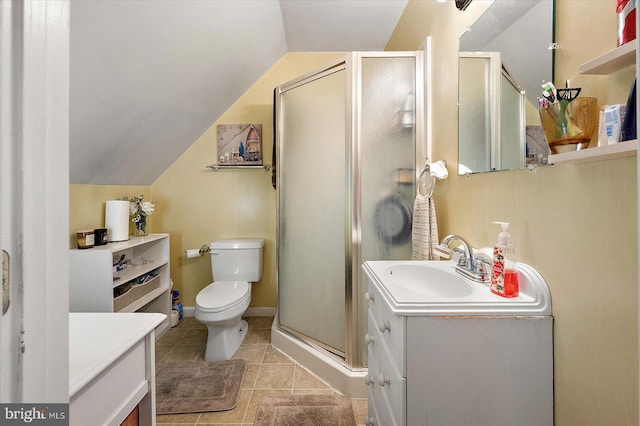 38967 Willow Ln, Fenwick Island, DE 19944 - bathroom with vanity, vaulted ceiling, a shower stall, toilet, and tile patterned floors