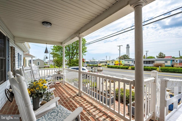 38967 Willow Ln, Fenwick Island, DE 19944 - balcony with a porch and a residential view
