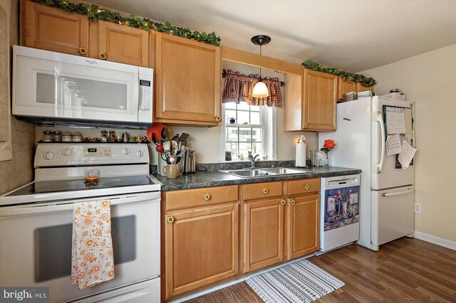 38967 Willow Ln, Fenwick Island, DE 19944 - kitchen featuring white appliances, a sink, dark countertops, and dark wood-style floors