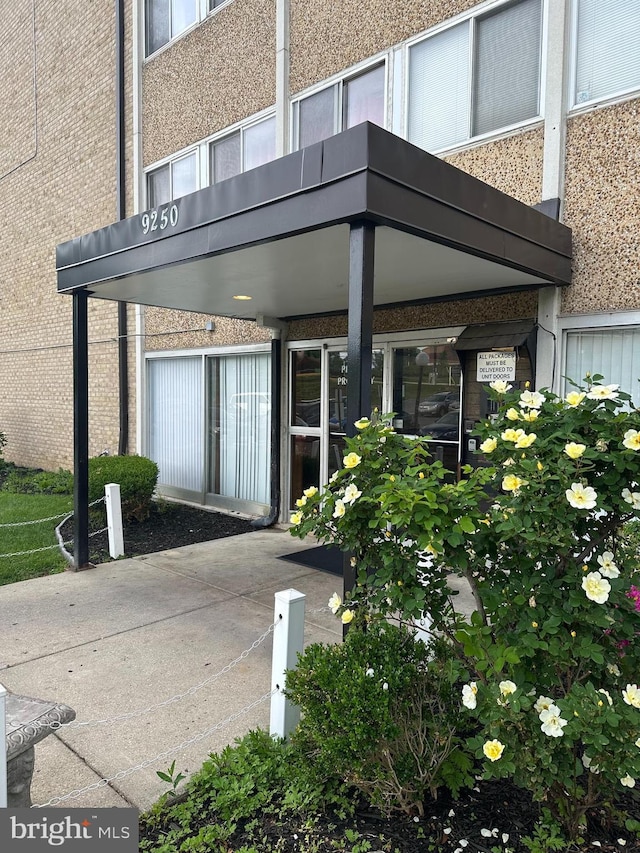 9250 Edwards Way Unit 101-A, Hyattsville, MD 20783 - view of exterior entry with brick siding